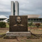 Edifício da CLDF em Brasília sob céu nublado, representando divulgação do Prêmio Marielle Franco em meio a retrocessos em direitos humanos.